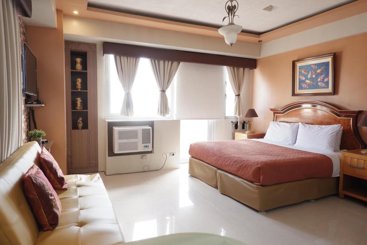 One Palm Tree Villas مانيلا المظهر الخارجي الصورة