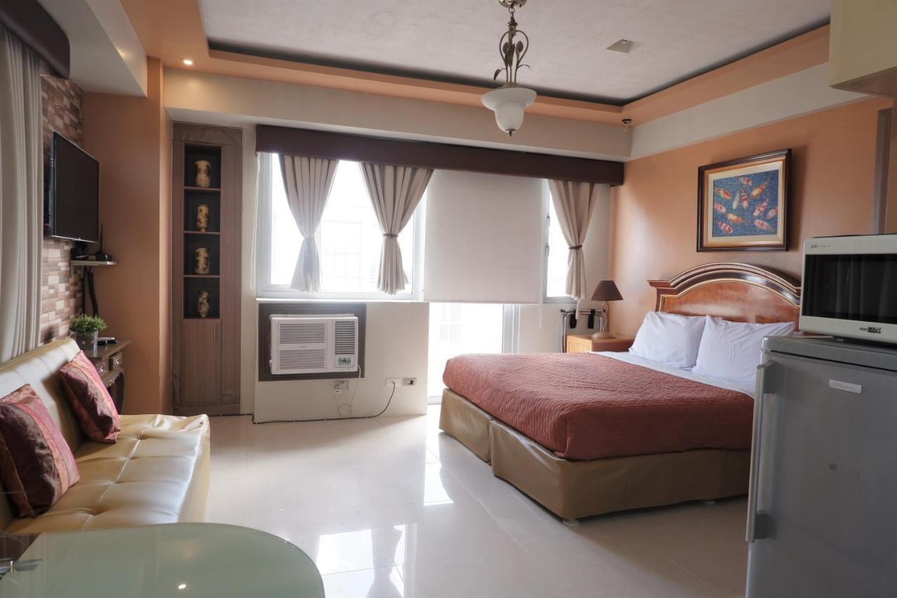 One Palm Tree Villas مانيلا المظهر الخارجي الصورة