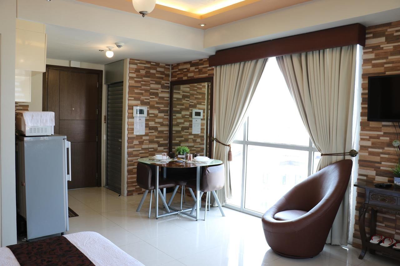 One Palm Tree Villas مانيلا المظهر الخارجي الصورة