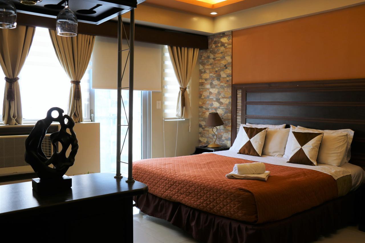 One Palm Tree Villas مانيلا المظهر الخارجي الصورة
