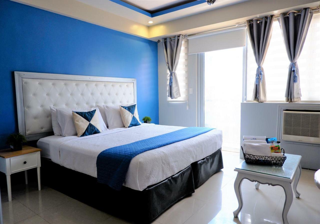 One Palm Tree Villas مانيلا المظهر الخارجي الصورة